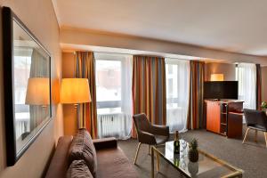 TV a/nebo společenská místnost v ubytování Hotel Quellenhof