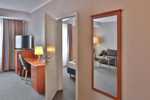 TV a/nebo společenská místnost v ubytování Hotel Quellenhof