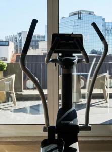 a exercise bike in front of a window at PortoBay Marquês in Lisbon