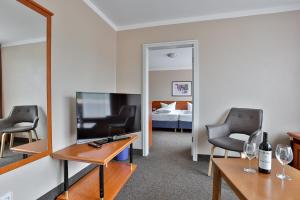 TV a/nebo společenská místnost v ubytování Hotel Quellenhof