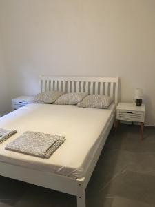 Postel nebo postele na pokoji v ubytování Villa Dafina