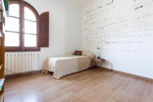 Posteľ alebo postele v izbe v ubytovaní Apartamento a los pies del Alcázar