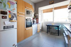 Kuchyňa alebo kuchynka v ubytovaní Apartamento a los pies del Alcázar