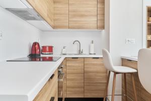 Kuchnia lub aneks kuchenny w obiekcie Villa Nova Lux Apartment Wrocław Kowale by Noclegi Renters