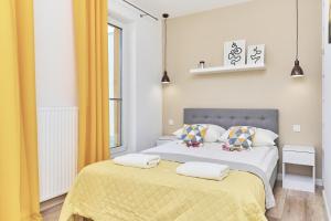 Łóżko lub łóżka w pokoju w obiekcie Villa Nova Lux Apartment Wrocław Kowale by Noclegi Renters