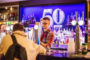 The lounge or bar area at a&o Edinburgh City 