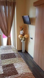 Posteľ alebo postele v izbe v ubytovaní Zafír Sziget Apartman