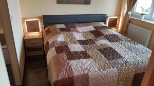 Posteľ alebo postele v izbe v ubytovaní Zafír Sziget Apartman