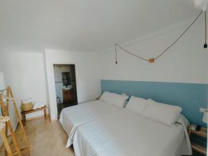 Postel nebo postele na pokoji v ubytování H El Palmeral Playa