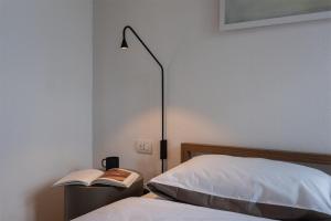 Posteľ alebo postele v izbe v ubytovaní Maison Du Lac