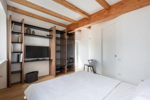 Posteľ alebo postele v izbe v ubytovaní Maison Du Lac