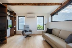 Posedenie v ubytovaní Maison Du Lac