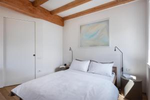 Posteľ alebo postele v izbe v ubytovaní Maison Du Lac
