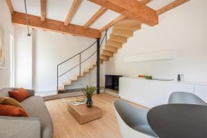 Posedenie v ubytovaní Maison Du Lac