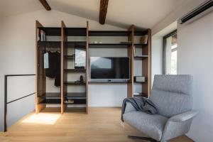 Posedenie v ubytovaní Maison Du Lac
