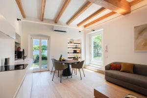 Posedenie v ubytovaní Maison Du Lac