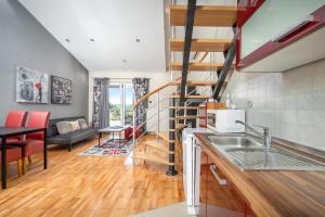 Kuchyňa alebo kuchynka v ubytovaní Apartmani Toplice
