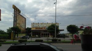 a car is parked in front of a building at Art Taiwan Homestay in Shunan