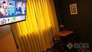TV o dispositivi per l'intrattenimento presso Hostal Residencial Mochica