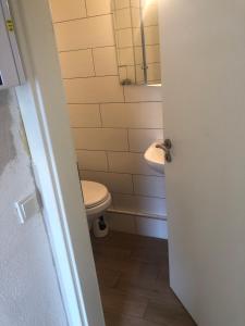 Vonios kambarys apgyvendinimo įstaigoje Seven’S Apartments