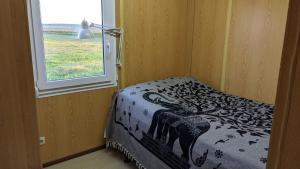 Katil atau katil-katil dalam bilik di Bjarnastaðir Guesthouse