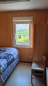 Katil atau katil-katil dalam bilik di Bjarnastaðir Guesthouse
