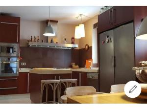 Kuchyň nebo kuchyňský kout v ubytování habitacion en casa kenya + 8 fotografií