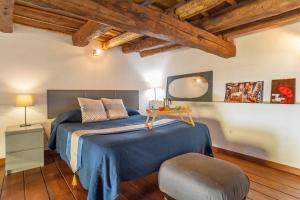 Posteľ alebo postele v izbe v ubytovaní L’Antico borgo di Trastevere