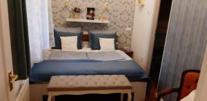 Posteľ alebo postele v izbe v ubytovaní Hédi apartman
