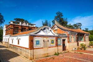 an old building with a chinese roof at Kinmenhouse of Old Tiles No 4 in Jincheng