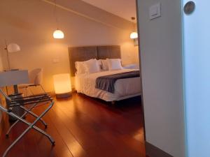 Postel nebo postele na pokoji v ubytování Hotel Ceres