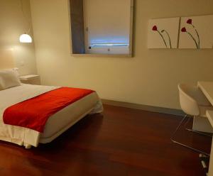 Postel nebo postele na pokoji v ubytování Hotel Ceres