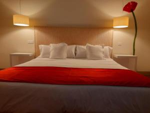 Postel nebo postele na pokoji v ubytování Hotel Ceres