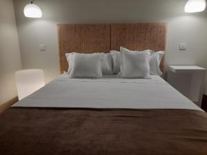 Postel nebo postele na pokoji v ubytování Hotel Ceres