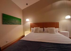 Voodi või voodid majutusasutuse Hotel Ceres toas