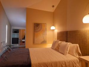 Postel nebo postele na pokoji v ubytování Hotel Ceres