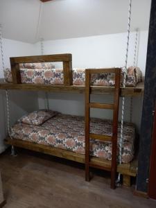 Tempat tidur susun dalam kamar di SECRET Apartments