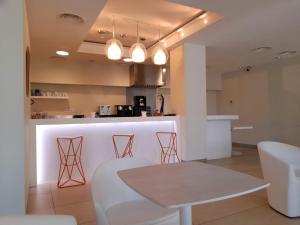 Kuchyň nebo kuchyňský kout v ubytování Hotel Ceres