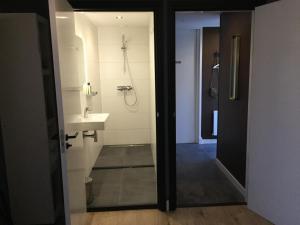 Koupelna v ubytování B&B De Kamer + 9 fotografií