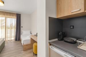 Kuchyňa alebo kuchynka v ubytovaní Sigma Luxury Rooms
