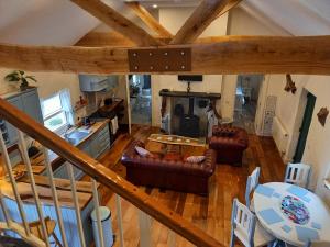 an overhead view of the living room and kitchen of a house at Mary's Bespoke Cottage in Killarney