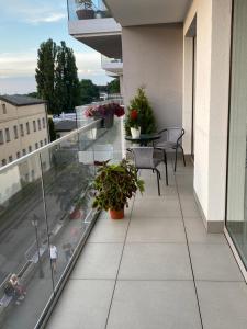 Balkon lub taras w obiekcie MIĘDZYZDROJE,BALTICUS PROMENADA GWIAZD 14, Apartament z odrębnym salonem i sypialnią z Widokiem na morze