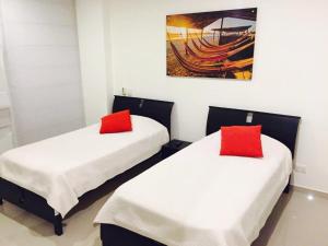 Postel nebo postele na pokoji v ubytování MORROS ULTRA APTO 706 + 5 fotografií