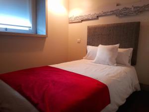 Postel nebo postele na pokoji v ubytování Hotel Ceres