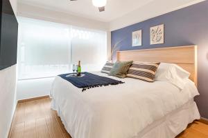 Een bed of bedden in een kamer bij MS Loft Suite Moderno Ubicadísimo 150MB 178A