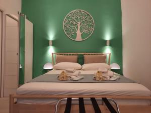 A bed or beds in a room at GELSO HOME