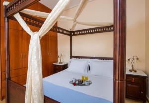 Кровать или кровати в номере Hilltop Villa Kontomari