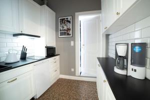 Kuchyňa alebo kuchynka v ubytovaní Sopot Haffnera Apartament