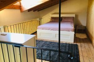 a bedroom with a bed in a small room at La casa nei campi in Badia Pavese +34 photos