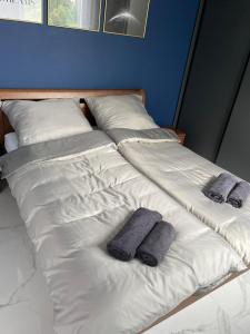 Ένα ή περισσότερα κρεβάτια σε δωμάτιο στο APARTMENT A&D Downtown
